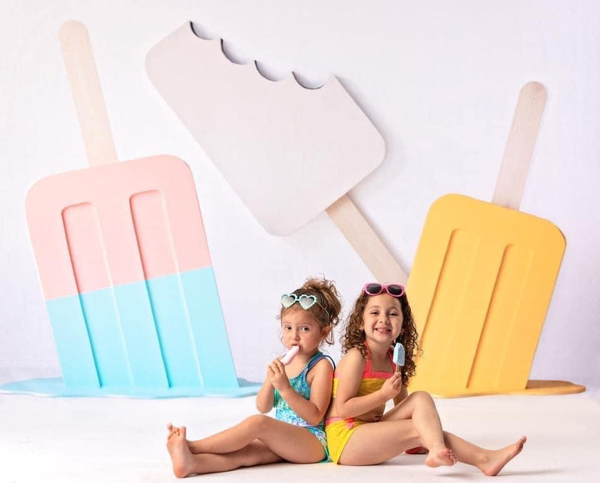 Three Popsicles on White